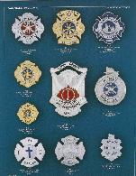 maltese cross and shield shaped fire badges