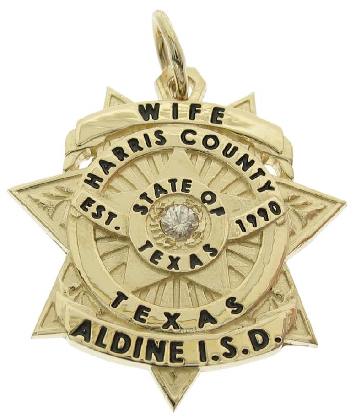 Custom Aldine TX ISD Police Officer badge pendant in 14k yellow gold with optional 0.07 ct. diamond and black enamel text.