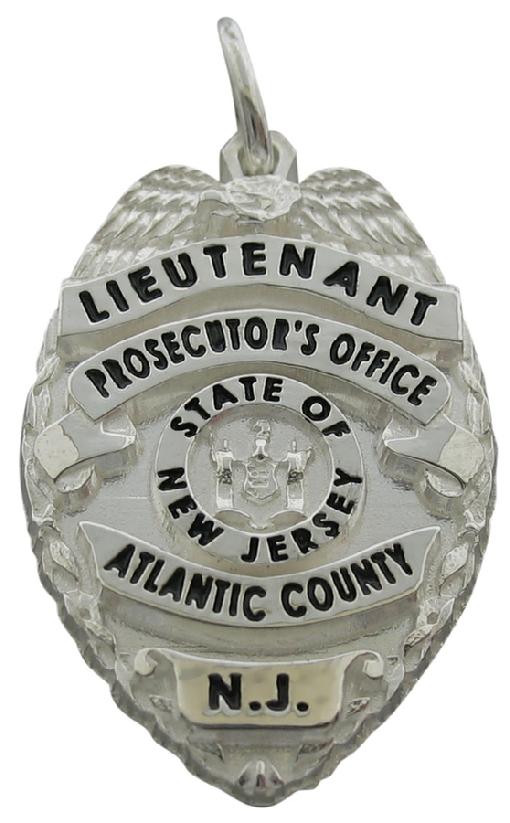 Custom Atlantic County, NJ Prosecutor badge pendant in sterling silver with black enamel.