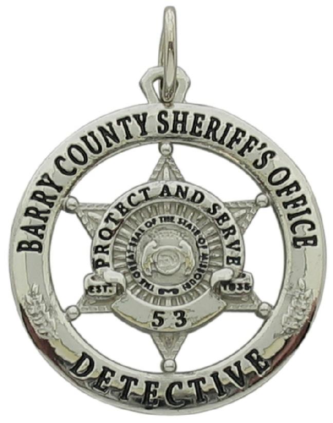 Custom Barry County, Missouri Sheriff's Detective badge pendant in 14k white gold with black enamel.