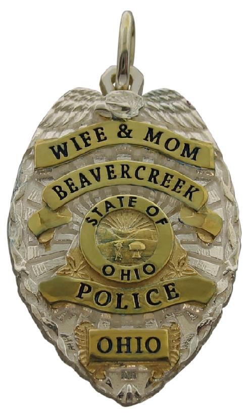 Custom Beavercreek OH Police Officer badge pendant in sterling silver with gold plate highlights and black enamel.