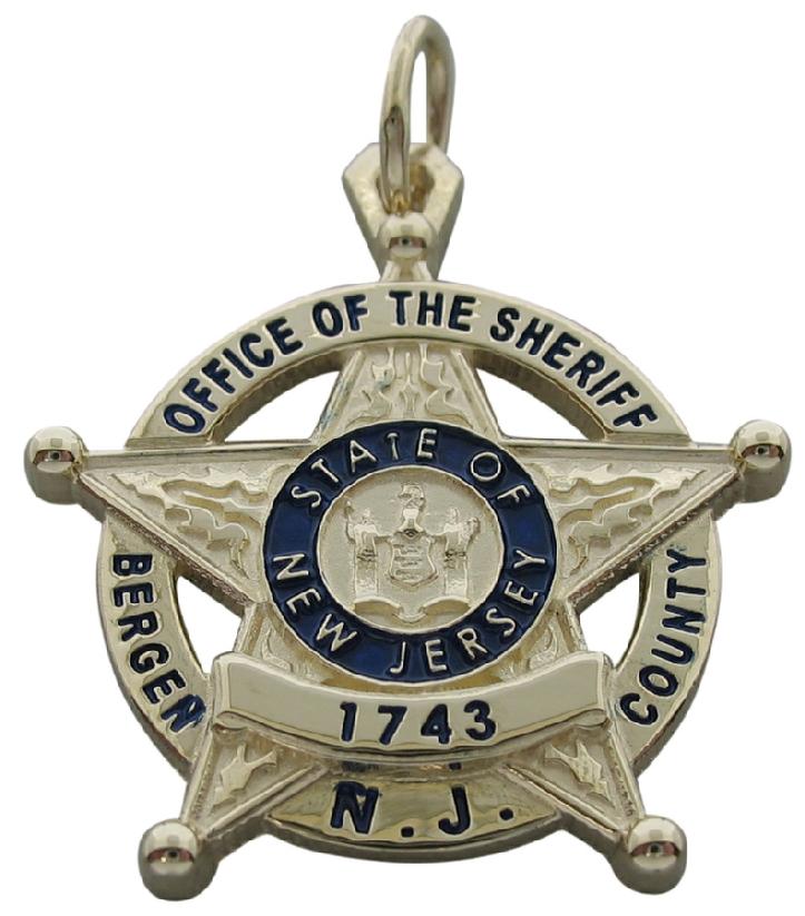 Custom Bergen County, NJ Sheriff badge pendant in 10k yellow gold with standing letter seal rim and blue enamel.