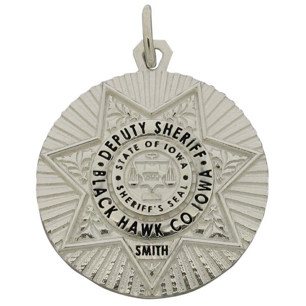 Custom Black Hawk IA Sheriff's Deputy badge pendant in sterling silver with black enamel.