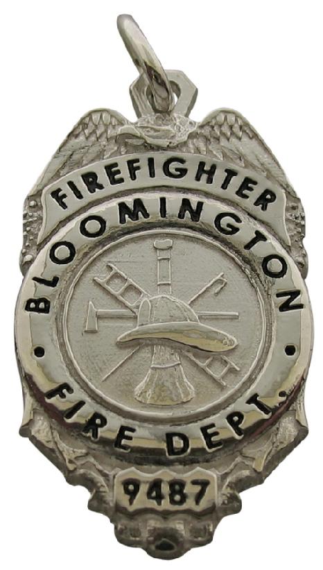 Custom Bloomington IL Firefighter badge pendant in sterling silver with fire scramble center seal and black enamel.