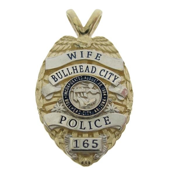 Custom Bullhead City (AZ) Police Officer badge pendant in 10k yellow gold with rhodium plate highlights and blue enamel. This pendant also features an optional 'Y' bail.