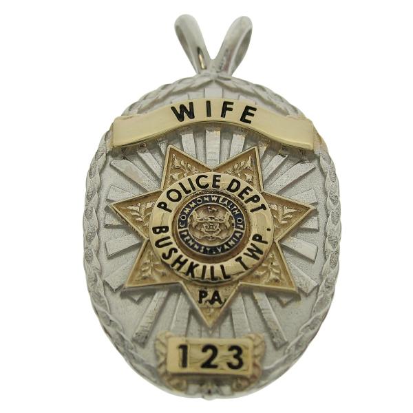 Custom Bushkill Twp. (PA) Police Officer badge pendant in 10k yellow gold with rhodium plated two tone finish, blue and black enamel, and an optional 'Y' bail.