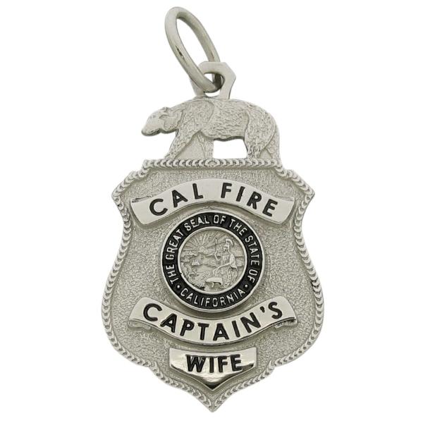 Custom CAL Fire Captain's badge pendant in 10k white gold with black enamel.