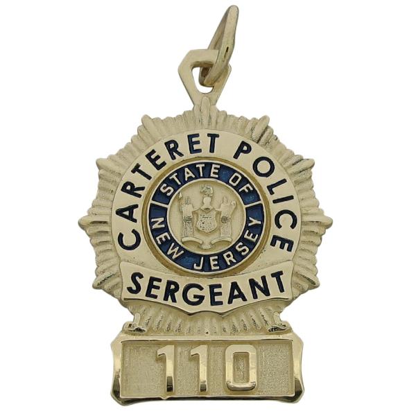 Custom Carteret (NJ) Police Sergeant badge pendant in 10k yellow gold with blue and black enamel.