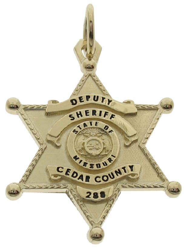 Custom Cedar MO Sheriff Deputy badge pendant in 10k yellow gold with black enamel.