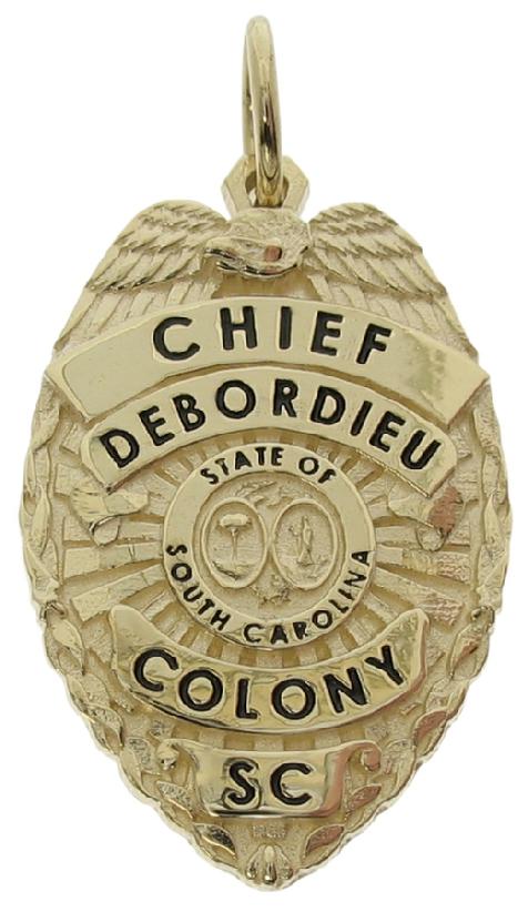 Custom Colony SC Police Chief badge pendant in 10k yellow gold with black enamel.