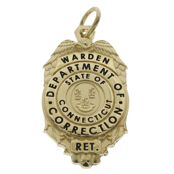 Custom Connecticut Department of Corrections Warden badge pendant in 14k yellow gold with black enamel.