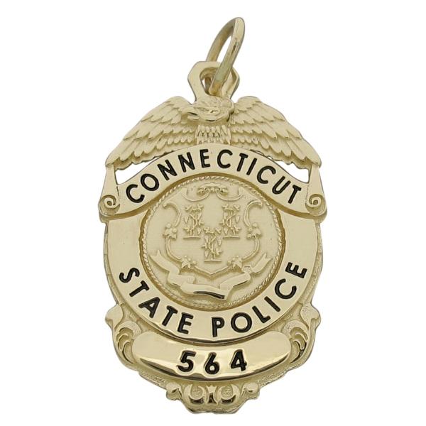 Custom Connecticut State Police Trooper badge pendant in 14k yellow gold with black enamel.