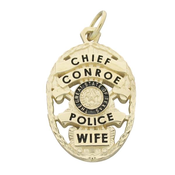 Custom Conroe (TX) Police Chief badge pendant in 10k yellow gold with black enamel.