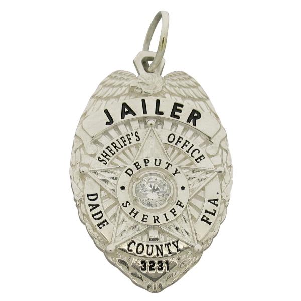Custom Dade County FL Sheriff's Jailer badge pendant in sterling silver with black enamel.
