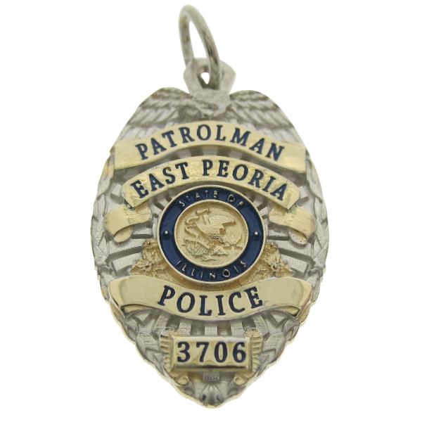 Custom East Peoria IL Police Patrolman badge pendant in 14k yellow gold with rhodium plated two tone finish and blue enamel.