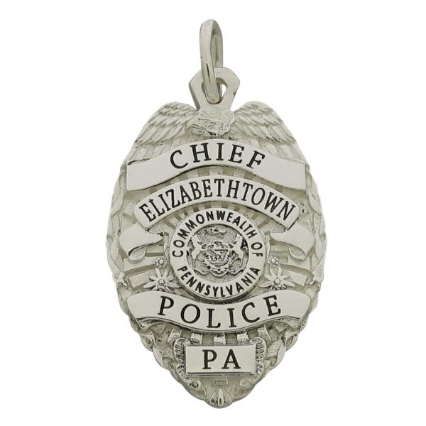 Custom Elizabethtown (PA) Police Chief's badge pendant in sterling silver with black enamel.