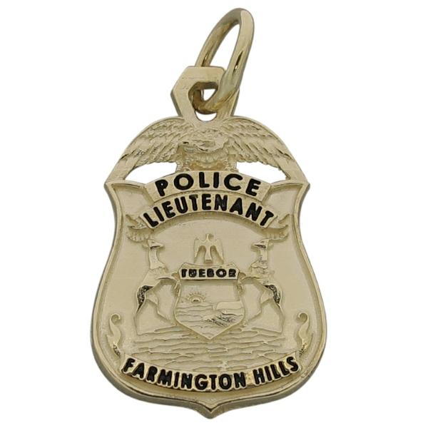 Custom Farmington Hills MI Police Lieutenant badge pendant in 10k yellow gold with black enamel.