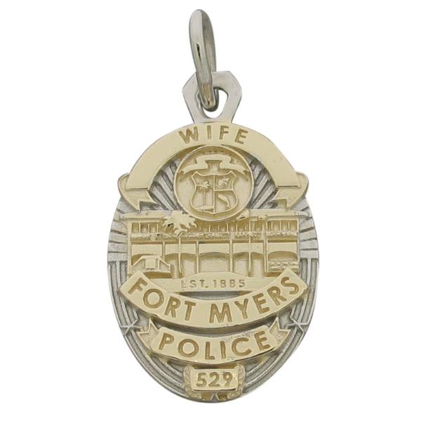 Custom Fort Myers FL Police badge pendant in 10k yellow gold with rhodium plate two tone. Engraved ribbons with no enamel.