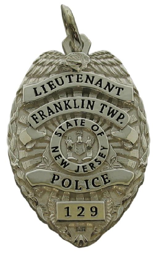 Custom Franklin Township NJ Police Lieutenant badge pendant in sterling silver with black enamel.
