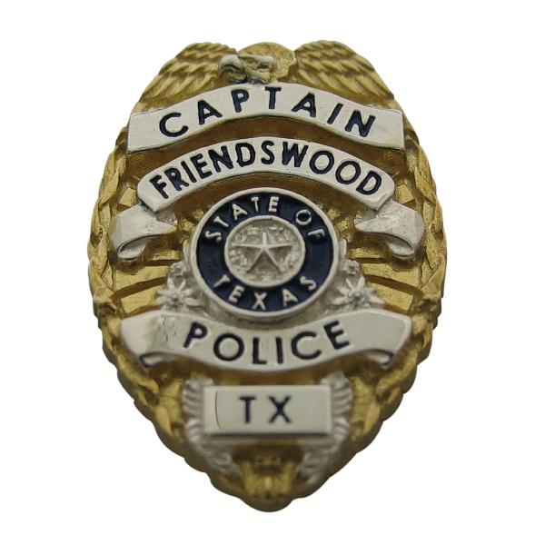 Custom Friendswood TX Police Lieutenant badge lapel pin in sterling silver with gold plated two tone finish, enamel text and standing letter center seal bezel.