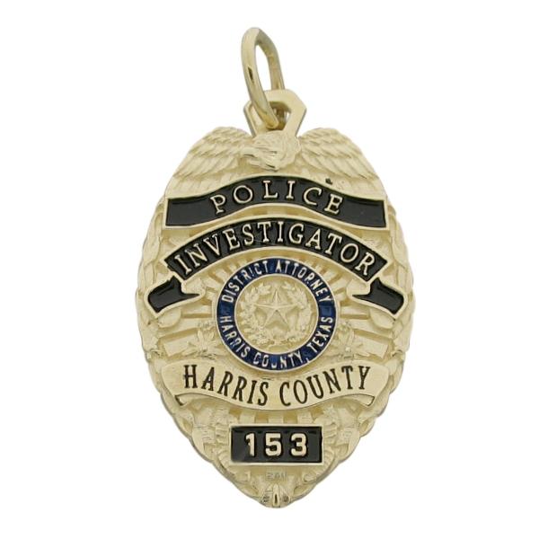 Custom Harris County TX District Attorney Investigator badge pendant in 10k yellow gold with blue and black enamel.