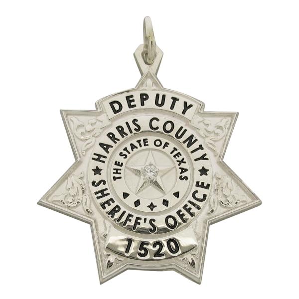 Custom Harris County TX Sheriff Deputy badge pendant in sterling silver with a 0.03 ct. diamond and black enamel.