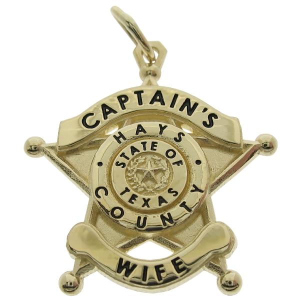 Custom Hays County TX Sheriff Captain badge pendant in 10k yellow gold with black enamel text.