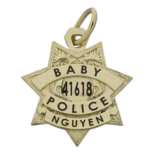 Custom Hayward CA Police Officer badge charm in 14k yellow gold with black enamel.