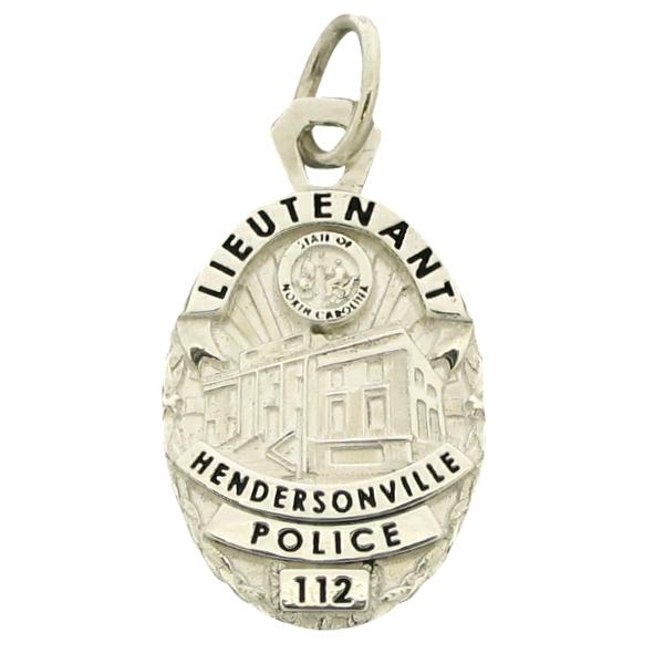 Custom Hendersonville NC Police Lieutenant badge pendant in sterling silver with black enamel text.