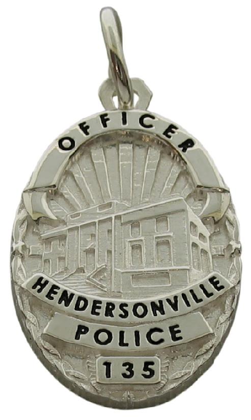 Custom Hendersonvile NC Police Officer badge charm in sterling silver with black enamel.