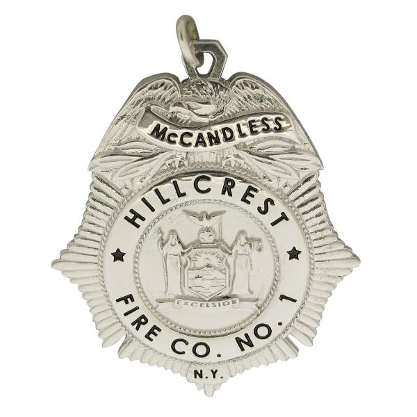 Custom Hillcrest NY Fire Co. 1 badge pendant in sterling silver with black enamel.