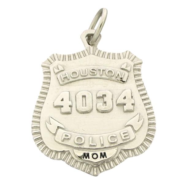 Custom Houston Police Officer badge pendant in 10k white gold with raised number and ribbon text and extra tab with Mom engraved and color-filled in black enamel.