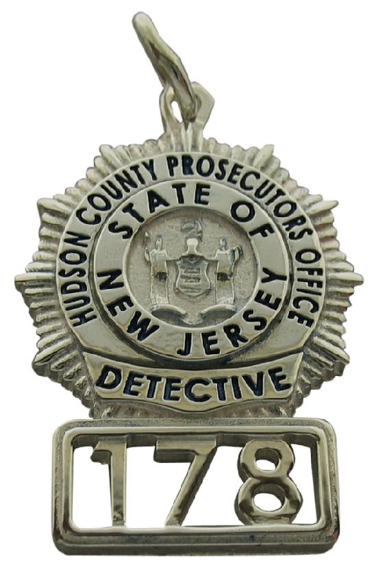 Custom Hudson County NJ Prosecutor Detective badge pendant in sterling silver with black enamel and cutout badge number.