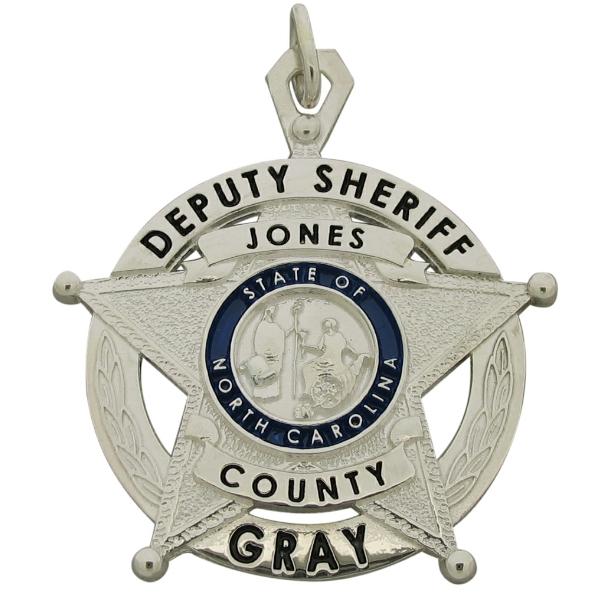 Custom Jones County NC Sheriff's Deputy badge pendant in sterling silver with blue and black enamel.