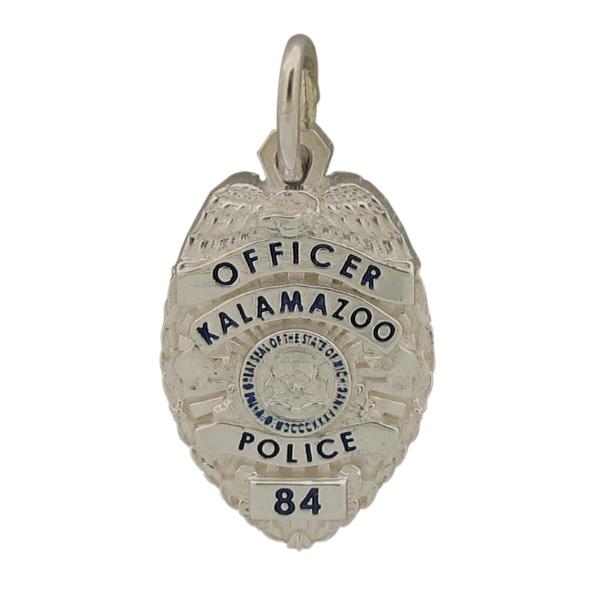 Custom Kalamazoo MI Police Officer badge charm in sterling silver with enamel text.