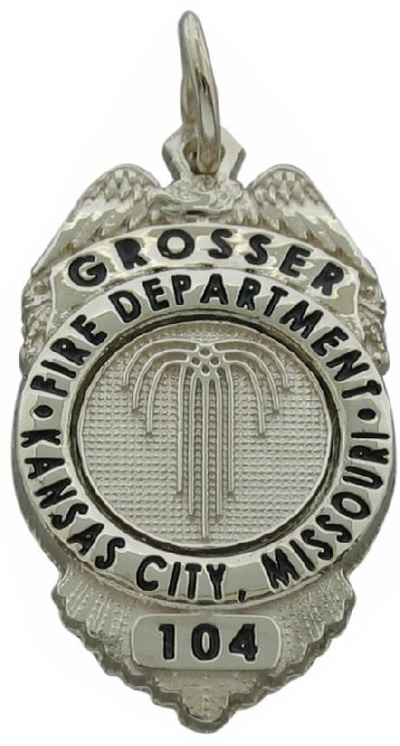 Custom Kansas City, MO Fire Department badge pendant in 14k white gold with black enamel text.