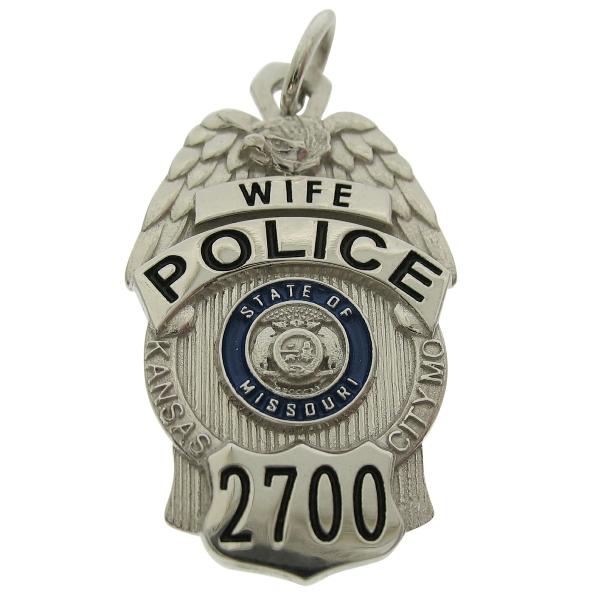 Custom Kansas City MO Police Officer badge pendant in 10k white gold with blue and black enamel.