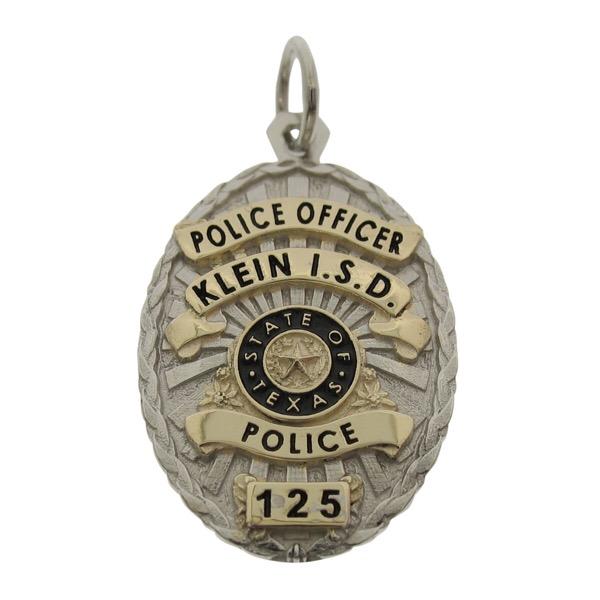 Custom Klein ISD TX Police Officer badge pendant in 10k yellow gold with rhodium plated shield and black enamel.