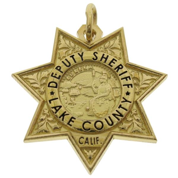 Custom Lake County CA Sheriff's Deputy memorial badge pendant in gold plated sterling silver with black enamel.