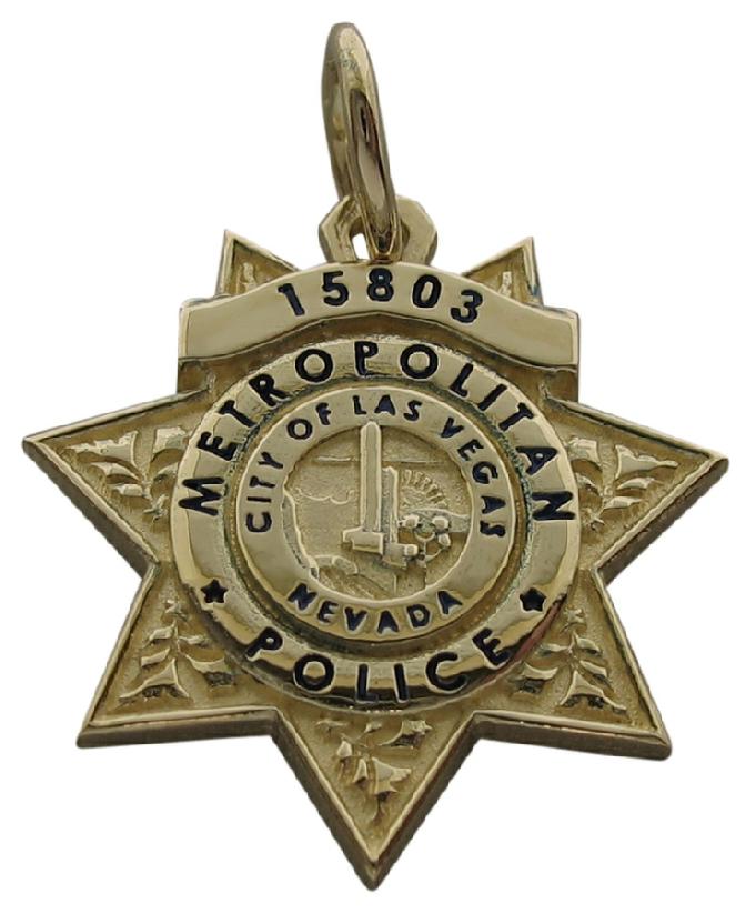 Custom Las Vegas NV Metropolitan Police Officer badge charm in 10k yellow gold with black enamel.