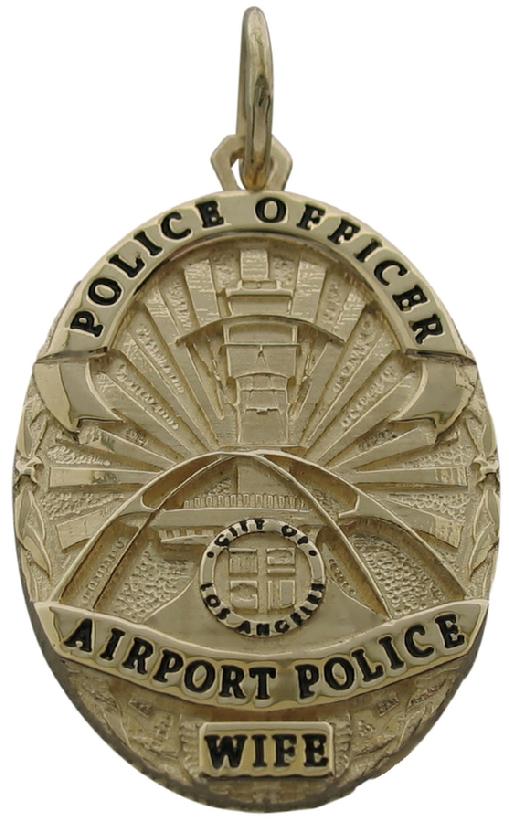 Custom Los Angeles, CA Airport Police badge pendant in 14k yellow gold with black enamel.