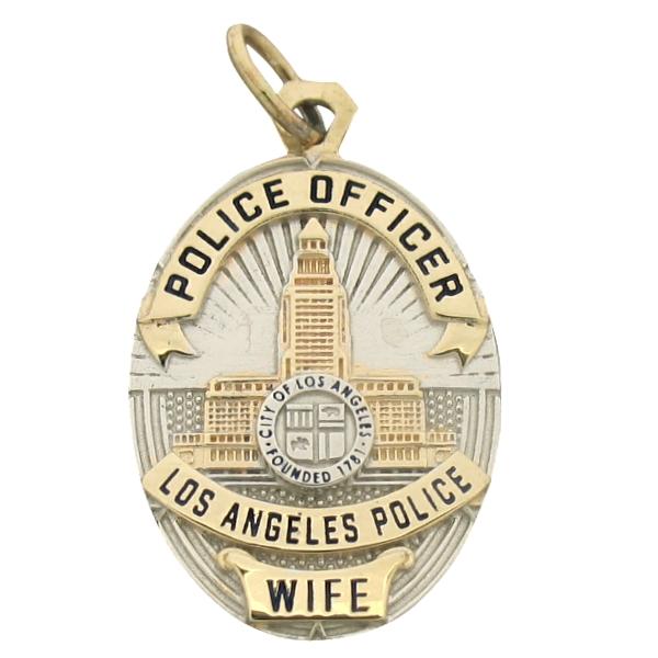 Custom Los Angeles CA Police Officer badge pendant in 10k yellow gold with rhodium plate two tone finish and enamel highlights and text.