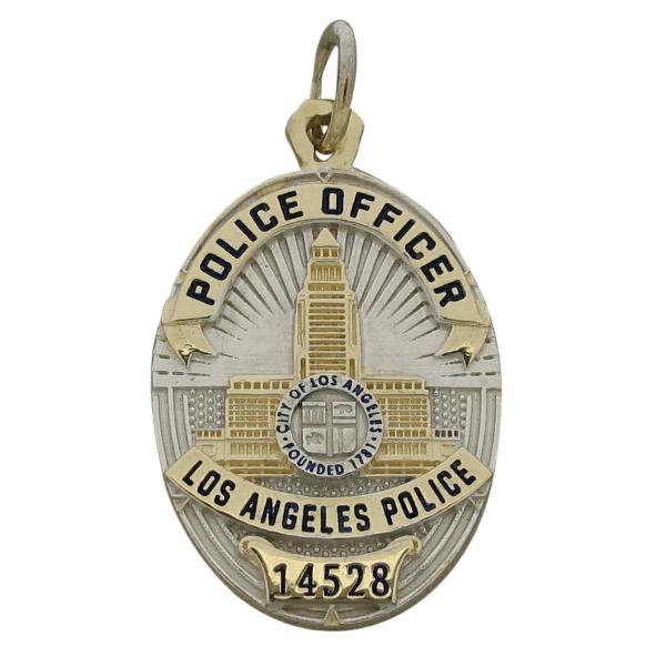 Custom Los Angeles CA Police Officer badge pendant in 10k gold with two tone finish and black enamel.