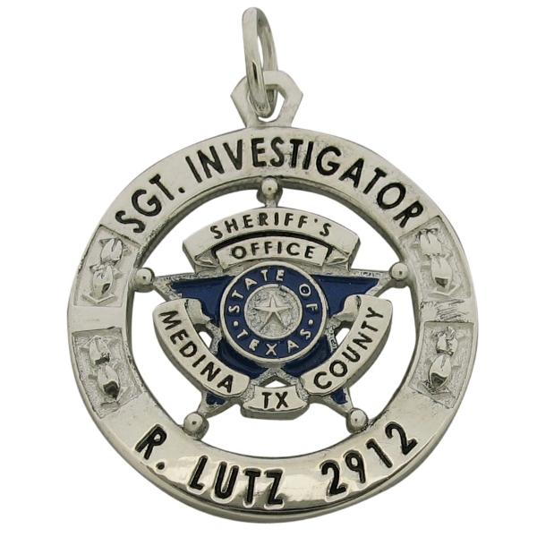 Custom Medina TX Sheriff's Sergeant Investigator badge pendant in sterling silver with blue and black enamel.