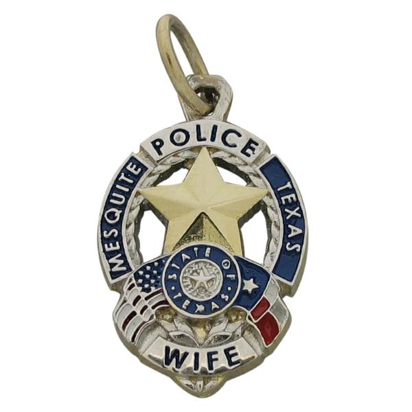 Custom Mesquite TX Police Officer badge pendant in 10k yellow gold with rhodium plated two tone finish and red, white, and blue enamel.