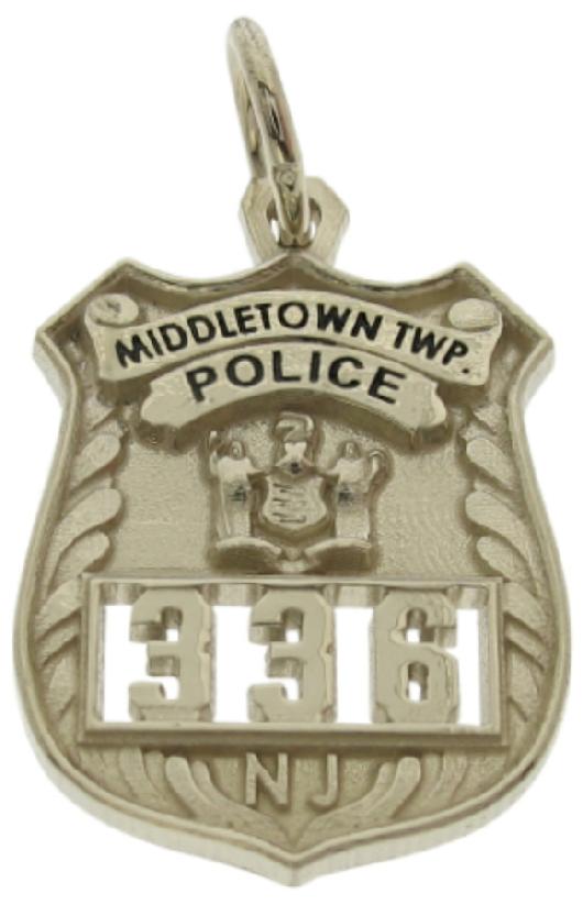 Custom Middletown Township NJ Police Officer badge pendant in 18k white gold with black enamel text and cutout badge number.