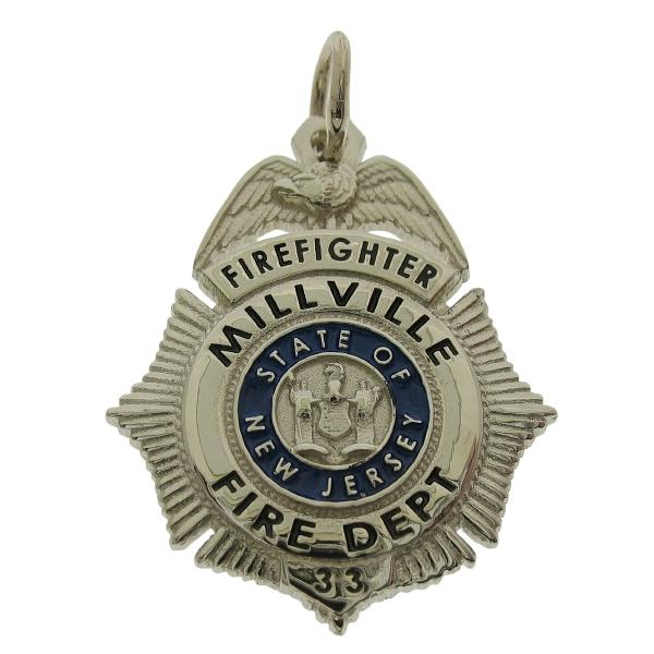 Custom Millville NJ Firefighter badge pendant in 10k white gold with blue and black enamel and standing letter seal bezel.