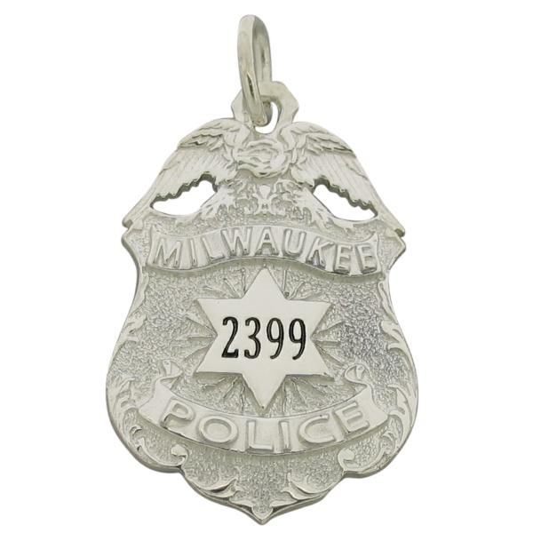 Custom Milwaukee WI Police Officer badge pendant in sterling silver with raised ribbon text and black enamel badge number.