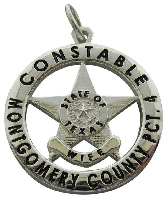 Custom Montgomery County, TX Precinct 4 Deputy badge pendant in sterling silver with black enamel text.
