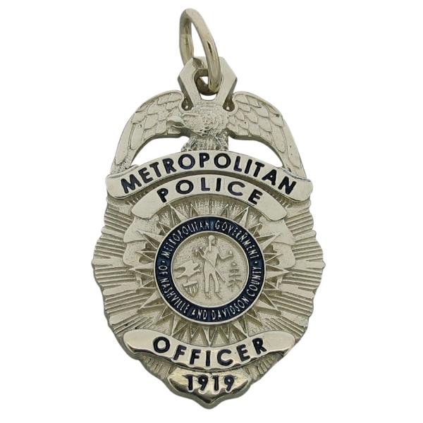 Custom Nashville TN Metropolitan Police Officer badge pendant in 10k white gold.